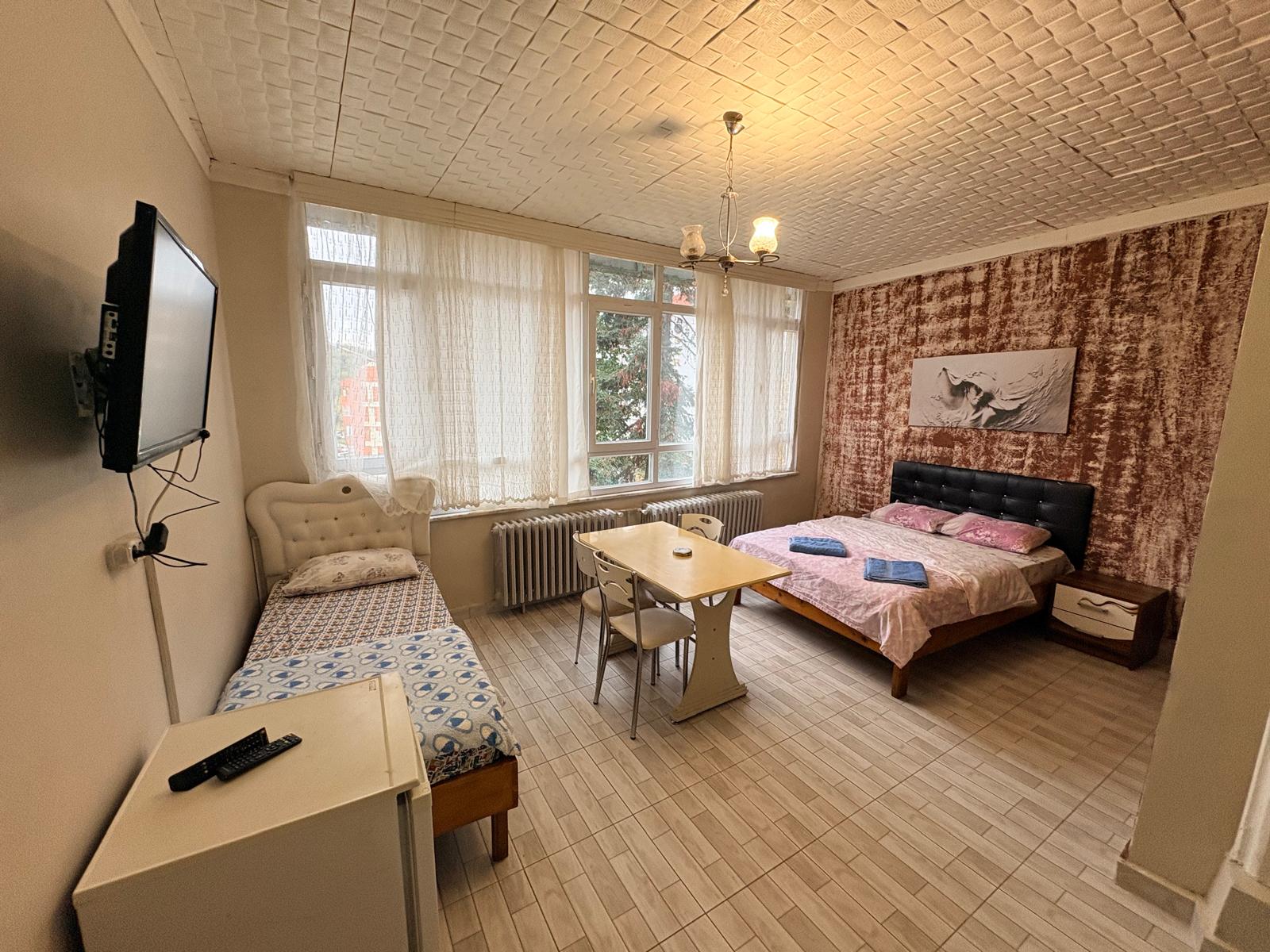 Üç kişilik oda örnek yerleşim